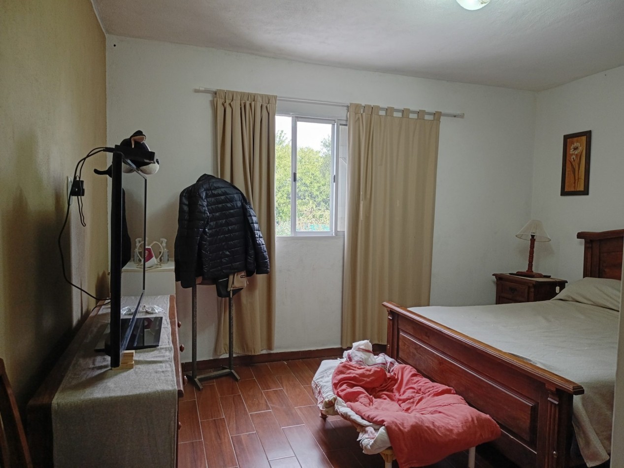 VENDO CASA 2 DOR. VILLA CATALINA. ESCRITURA Y OBRA DE GAS PAGADA.